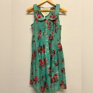 Knitted Dove sleeveless fit and flare Peter Pan collar Small Babydoll